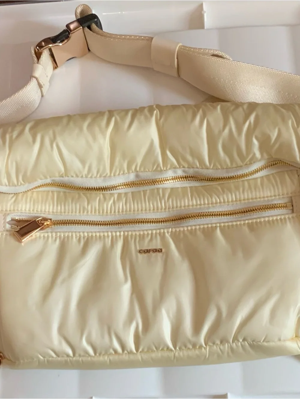 caraa Cream Puffer Crossbody Bag with Gold Hardware